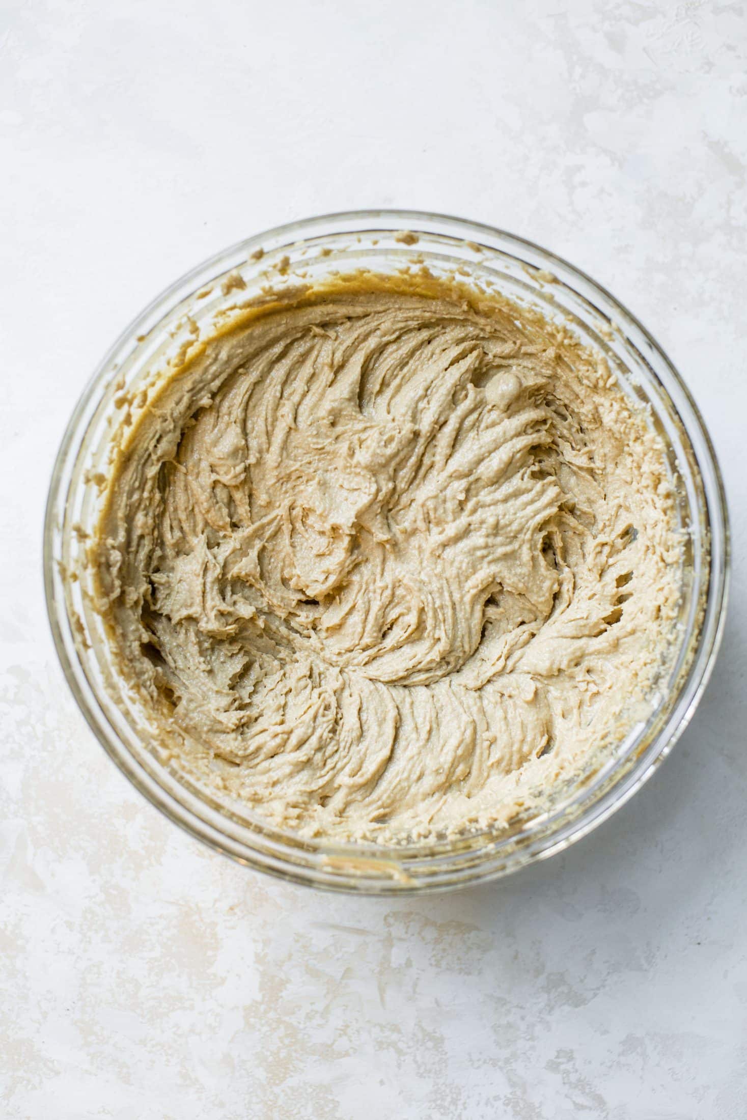 These are perfect peanut butter blossoms! My favorite cookie at christmastime has always been classic peanut butter blossoms and my grandma had the recipe nailed. These are super easy, delicious and will make a lot of cookies! I howsweeteats.com #peanutbutter #blossoms
