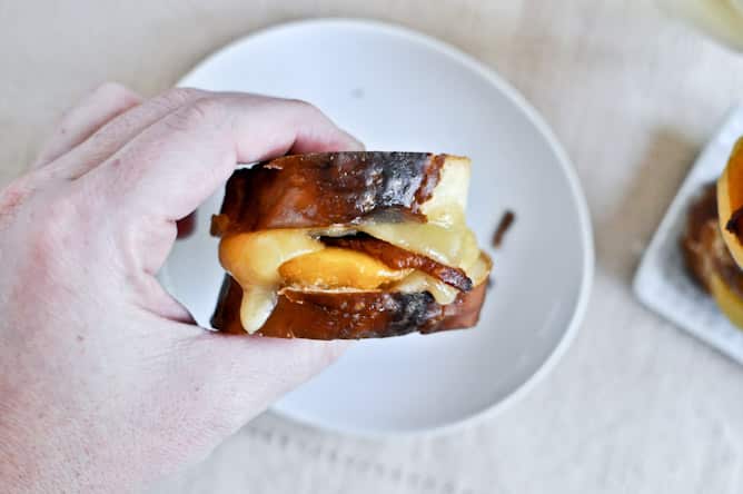 Peach, Bacon + Gouda Grilled Cheese Sliders on Pretzel Bread I howsweeteats.com Peach, Bacon + Gouda Grilled Cheese Sliders on Pretzel Bread I howsweeteats.com