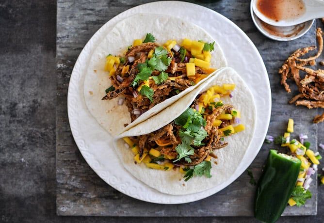Crockpot BBQ Beer Pulled Pork Tacos with Crispy Onion Straws and Mango Salsa I howsweeteats.com