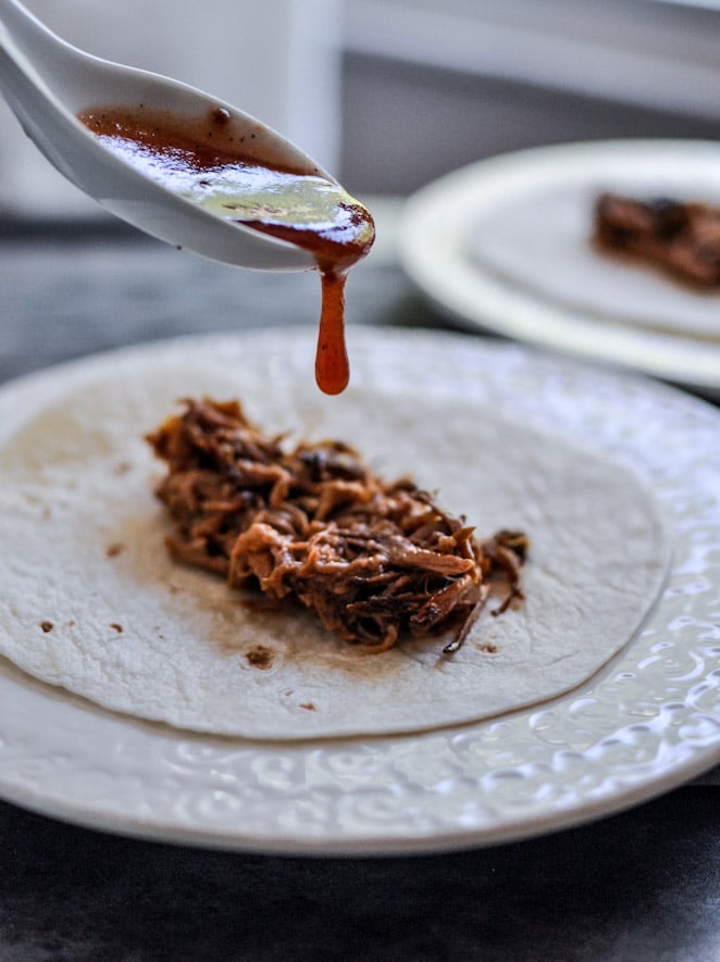 Crockpot BBQ Beer Pulled Pork Tacos with Crispy Onion Straws and Mango Salsa I howsweeteats.com