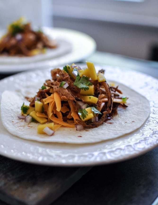 Crockpot BBQ Beer Pulled Pork Tacos with Crispy Onion Straws and Mango Salsa I howsweeteats.com