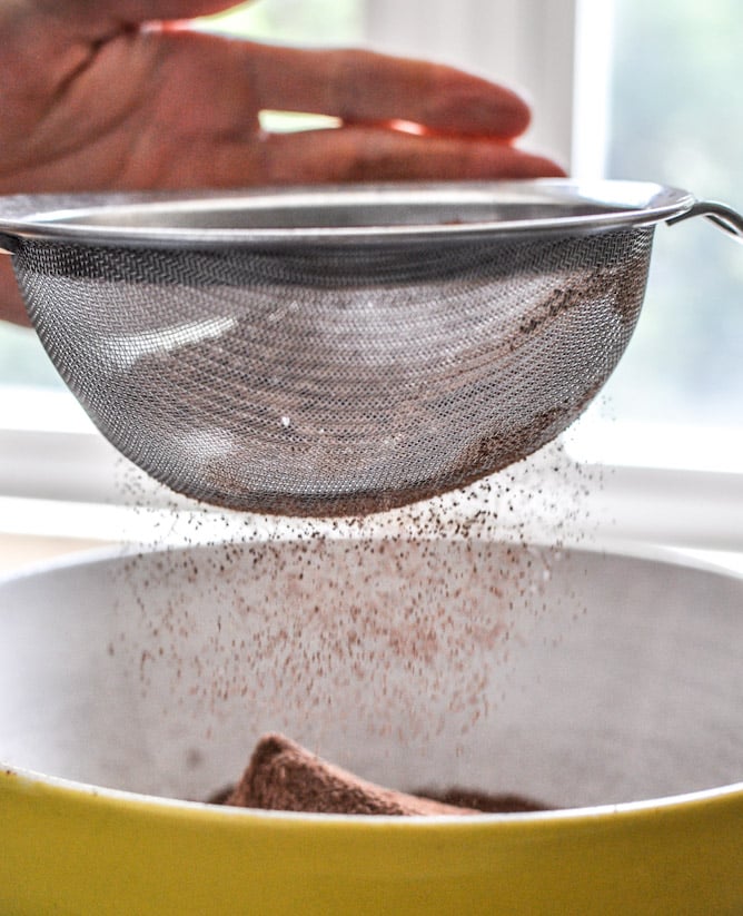 Glazed and Sprinkled Chocolate Cake Donut Holes I howsweeteats.com