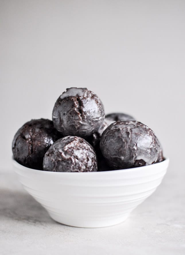 Glazed and Sprinkled Chocolate Cake Donut Holes I howsweeteats.com
