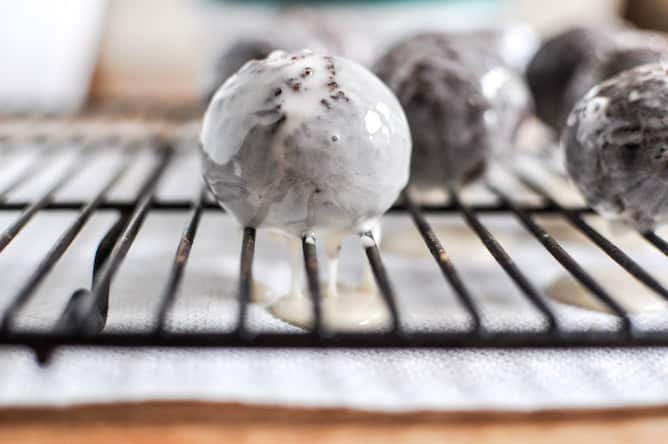 Glazed and Sprinkled Chocolate Cake Donut Holes I howsweeteats.com