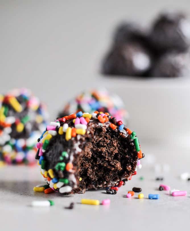 Glazed and Sprinkled Chocolate Cake Donut Holes I howsweeteats.com