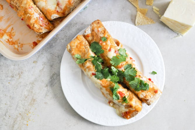 Lightened Up Chicken Enchiladas I howsweeteats.com
