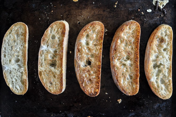 Fontina and Spinach Baked Eggs with Garlic Brown Butter Breadcrumbs I howsweeteats.com