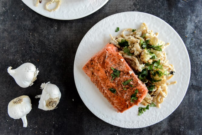 Broiled Salmon and Roasted Garlic Cream Noodles with Crispy Cauliflower + Toasted Pine Nuts I howsweeteats.com