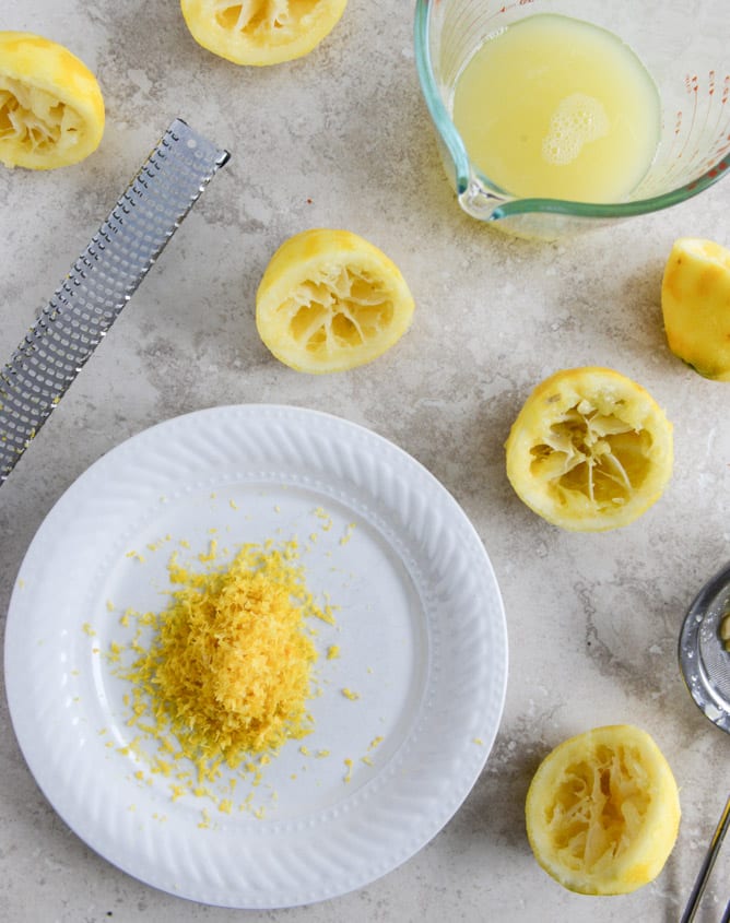 Easy Lemon Cake with Marshmallow Frosting + Toasted Coconut I howsweeteats.com