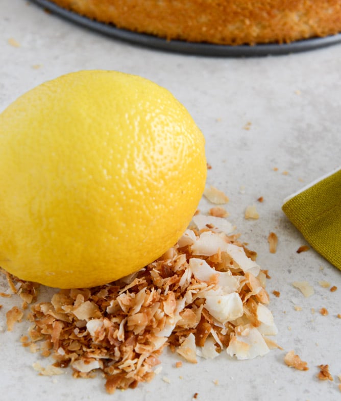Easy Lemon Cake with Marshmallow Frosting + Toasted Coconut I howsweeteats.com