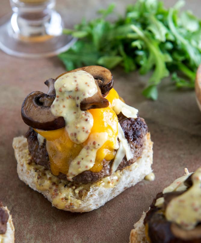 Cheeseburgers with Sautéed Mushrooms, Arugula and Dijon Aioli I howsweeteats.com