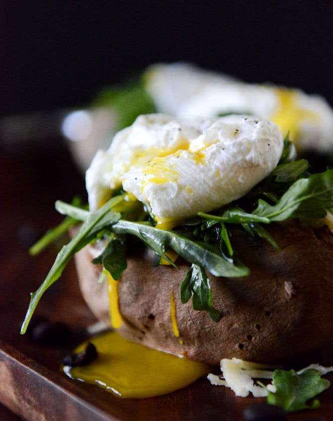 Cheesy Black Bean Stuffed Sweet Potatoes with Arugula + Poached Eggs I howsweeteats.com