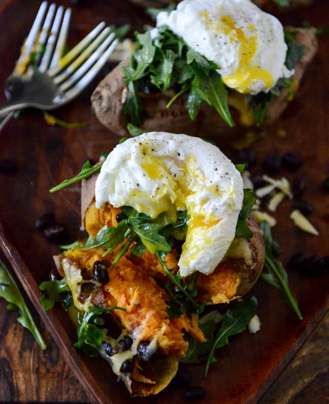 Cheesy Black Bean Stuffed Sweet Potatoes with Arugula + Poached Eggs I howsweeteats.com