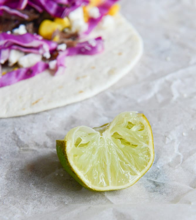 Crockpot Smoky Brisket Tacos with Shredded Cabbage + Sweet Corn I howsweeteats.com