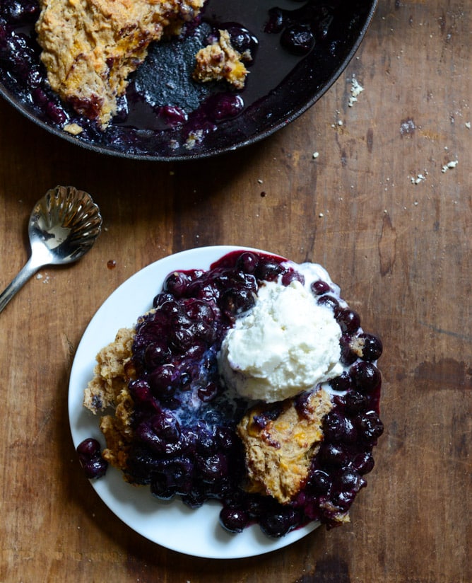 Skillet Blueberry Cobbler with a Cheddar Biscuit Crust I howsweeteats.com