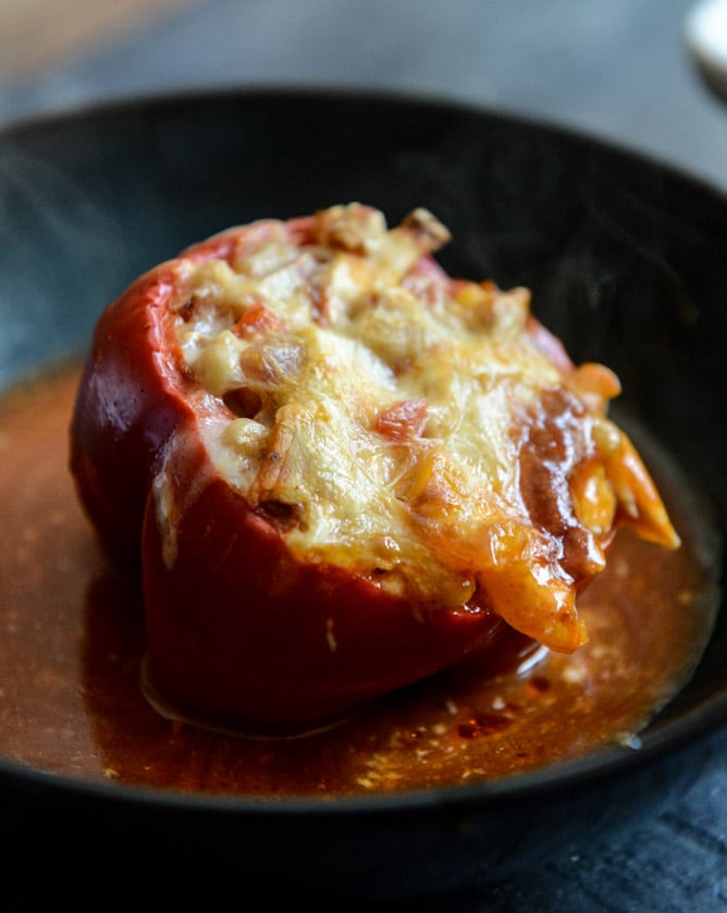 White Bean + Chicken Enchilada Stuffed Peppers I howsweeteats.com