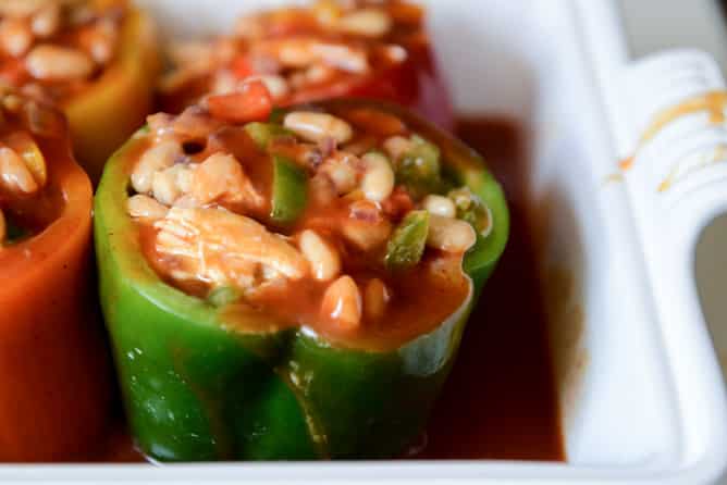 White Bean + Chicken Enchilada Stuffed Peppers I howsweeteats.com