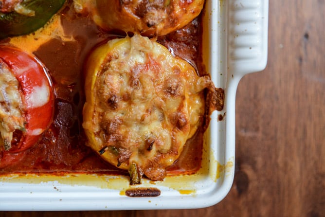 White Bean + Chicken Enchilada Stuffed Peppers I howsweeteats.com