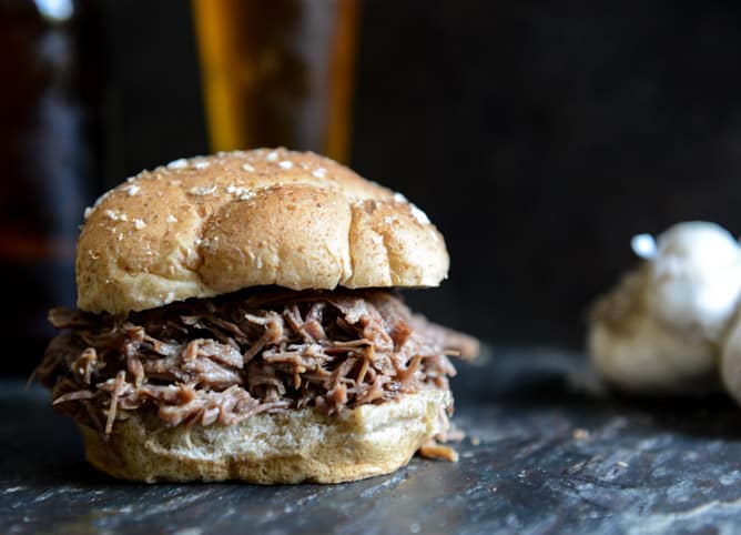 Crockpot Brown Sugar + Roasted Garlic Pulled Pot Roast Sandwiches I howsweeteats.com