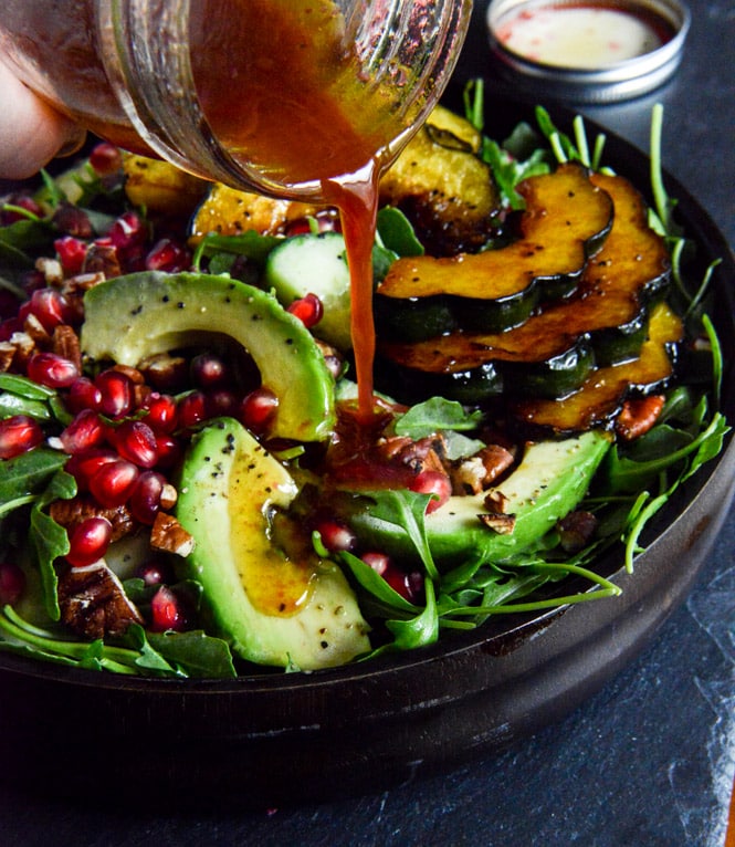 Autumn Arugula Salad with Caramelized Squash, Spiced Pecans and Pomegranate Ginger Vinaigrette I howsweeteats.com