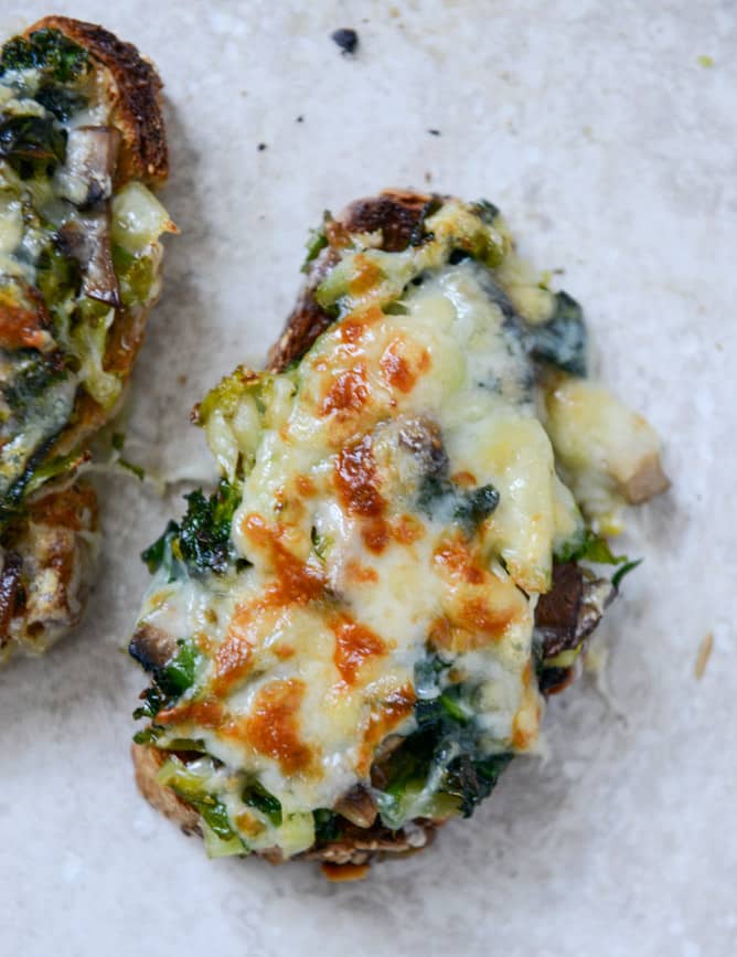 Broiled Fontina Toasts with Roasted Garlic and Poached Eggs I howsweeteats.com