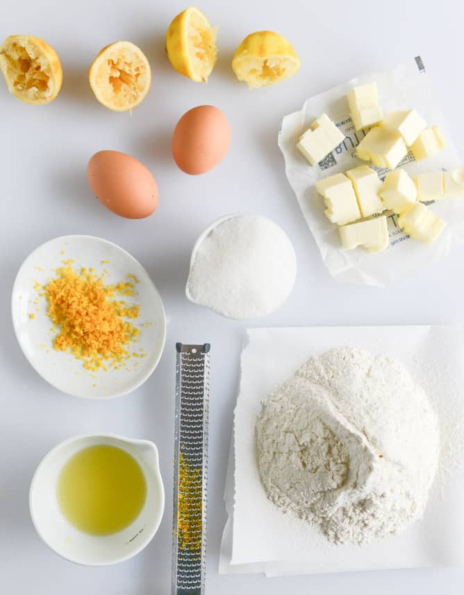 Fluffy Lemon Cupcakes with Whipped Coconut Cream I howsweeteats.com