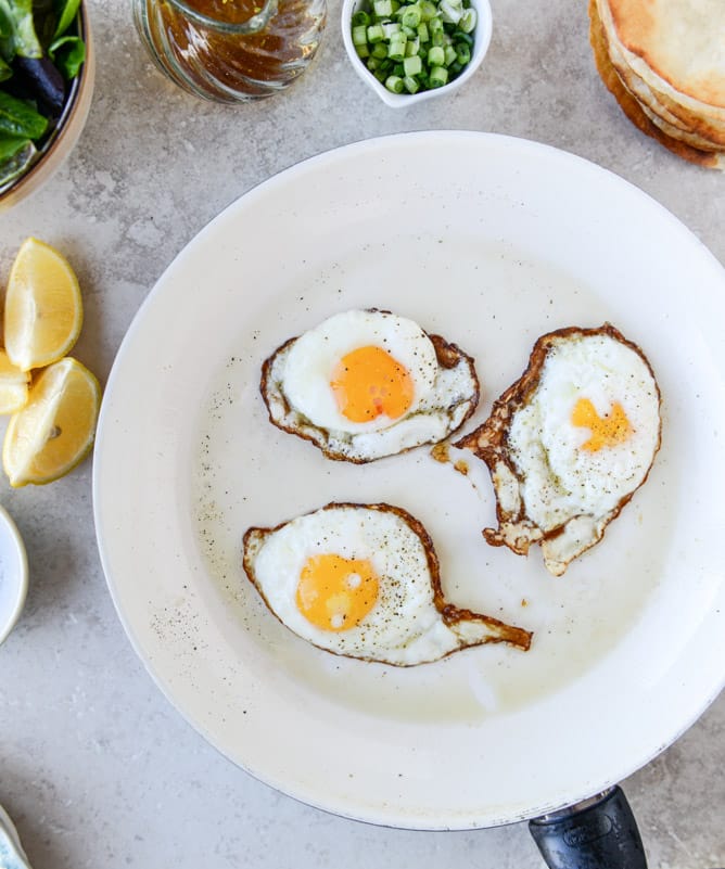 Fried Egg Crispy Tortillas with Lemon Greens and Toasted Sesame Oil I howsweeteats.com