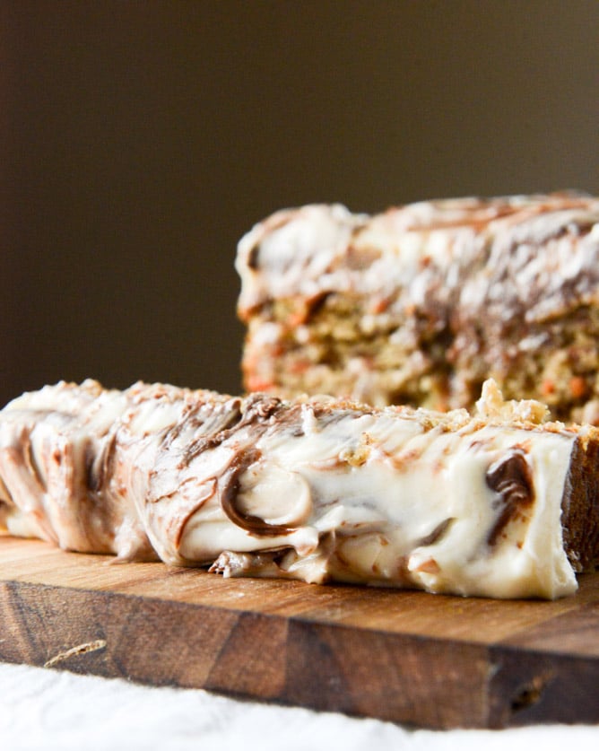 carrot cake cake with nutella swirled cream cheese frosting I howsweeteats.com