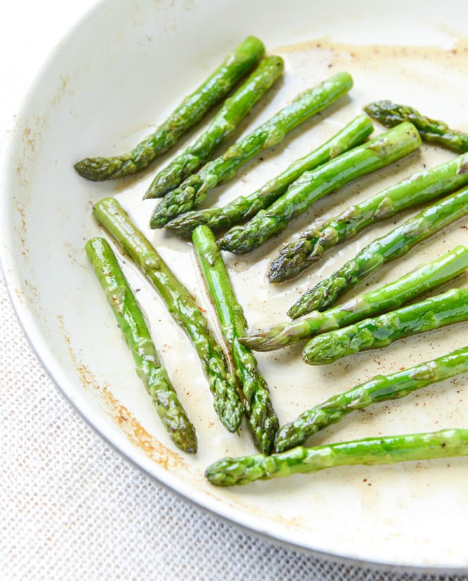 bacon blue deviled eggs with roasted garlic and asparagus I howsweeteats.com