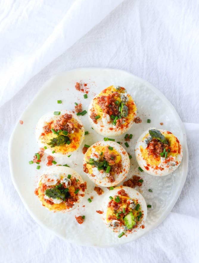 bacon blue deviled eggs with roasted garlic and asparagus I howsweeteats.com