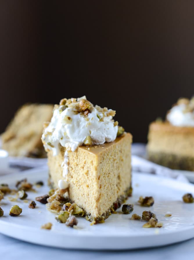 brown sugar pumpkin cheesecake with pistachio macaroon crust I howsweeteats.com