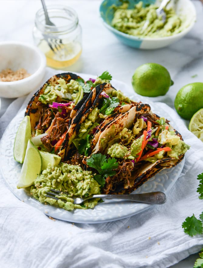 slow cooker sweet + spicy short rib tacos with sesame guacamole I howsweeteats.com