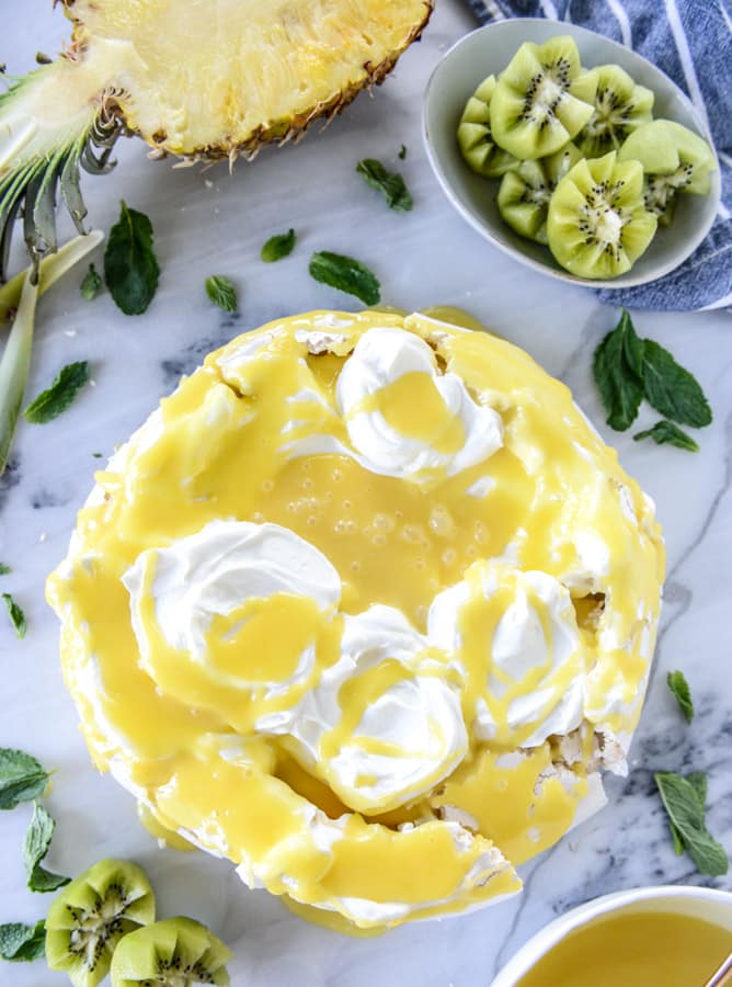 marshmallow pavlova with pineapple curd I howsweeteats.com