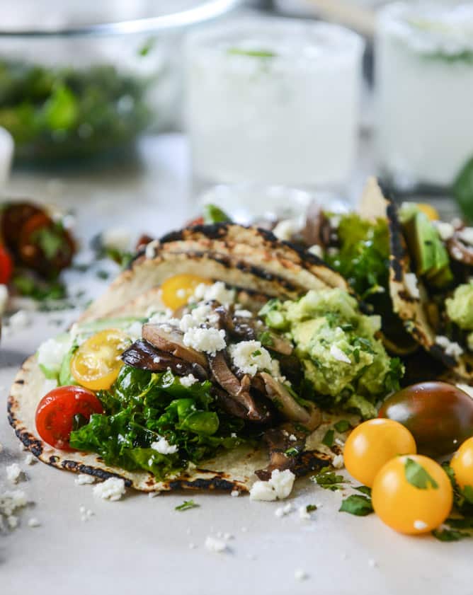 chipotle marinated kale and smoky mushroom tacos I howsweeteats.com
