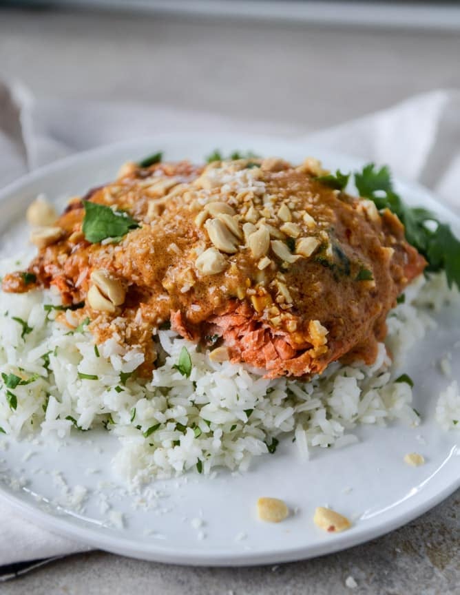salmon with thai curry peanut sauce and coconut cilantro rice I howsweeteats.com