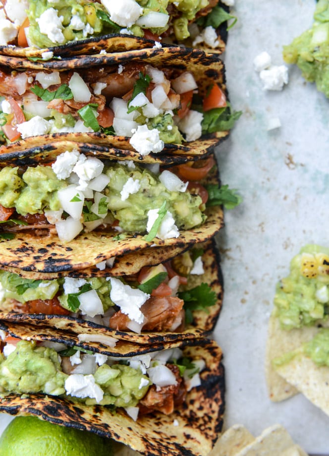 chicken tinga tacos with grilled corn guacamole by @howsweeteats I howsweeteats.com