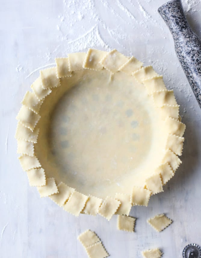 coconut custard pie with coconut whipped cream I howsweeteats.com