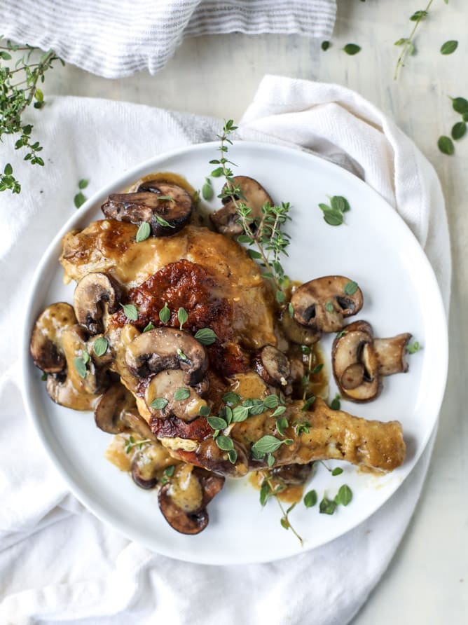 smothered skillet chicken with thyme butter mushrooms I howsweeteats.com