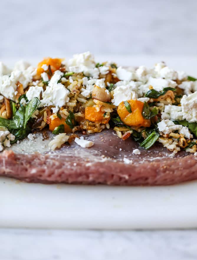 butternut, apple and goat cheese stuffed pork tenderloin I howsweeteats.com #pork #squash #holiday #recipes