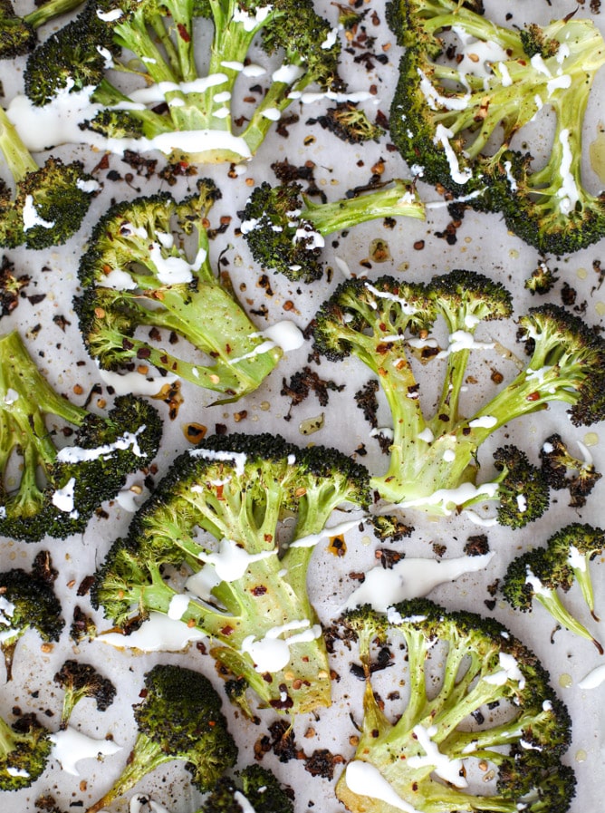 best roasted broccoli with goat cheese drizzle I howsweeteats.com #broccoli #roasted #goatcheese #spicy #lemon