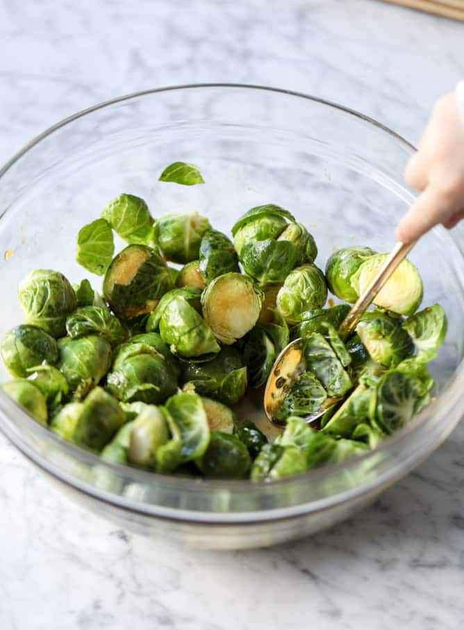sheet pan honey garlic salmon and brussels I howsweeteats.com #sheetpan #salmon #honeygarlic #brusselssprouts