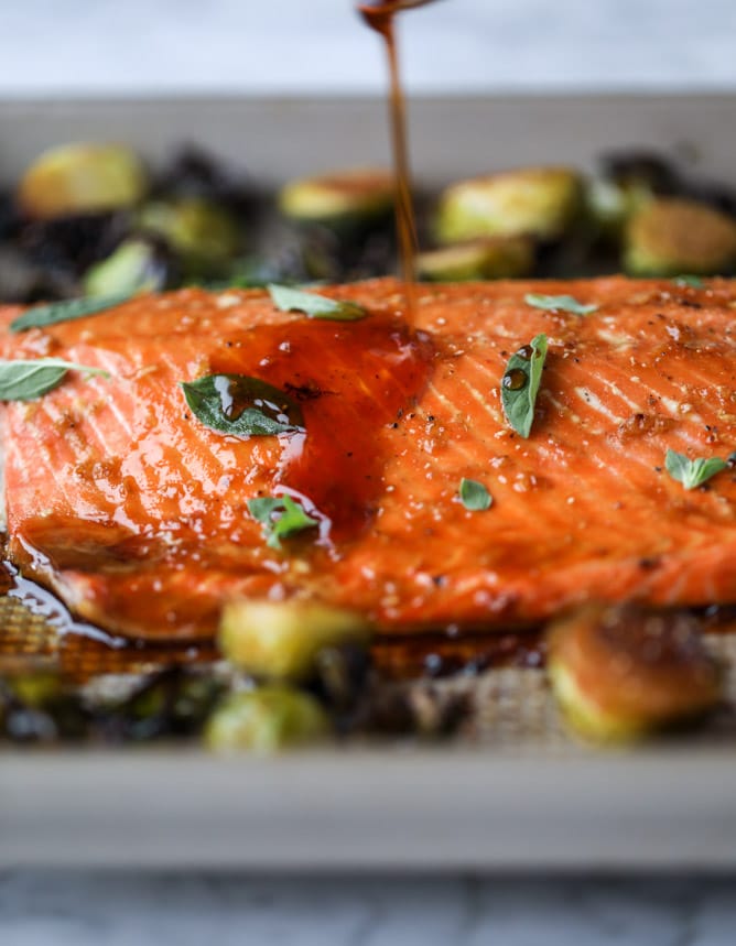 sheet pan honey garlic salmon and brussels I howsweeteats.com #sheetpan #salmon #honeygarlic #brusselssprouts