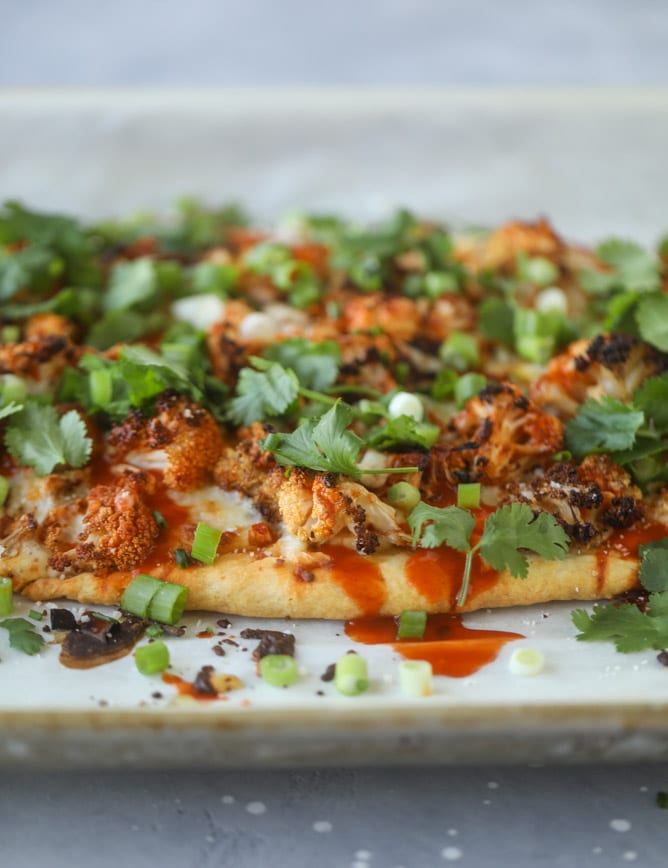 roasted buffalo cauliflower flatbread I howsweeteats.com #cauliflower #buffalo #pizza #flatbread