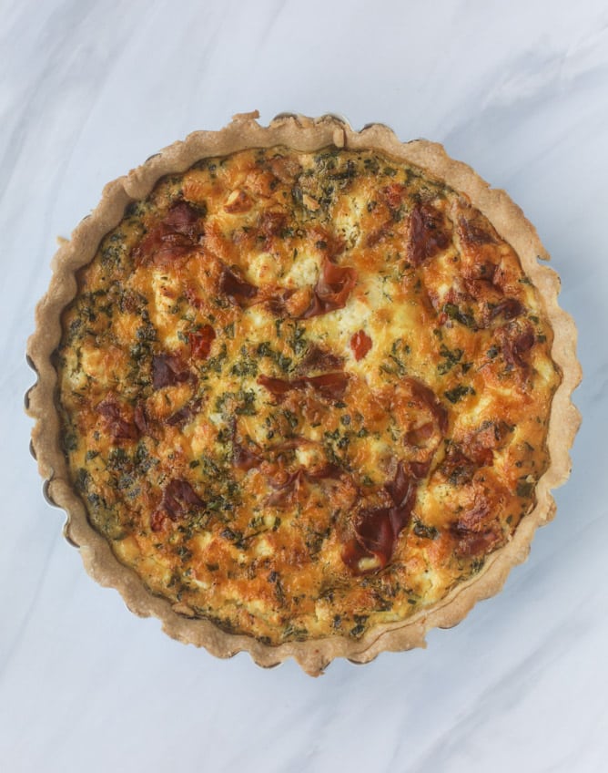prosciutto, herb & goat cheese quiche I howsweeteats.com #quiche #goatcheese #brunch #prosciutto #breakfast