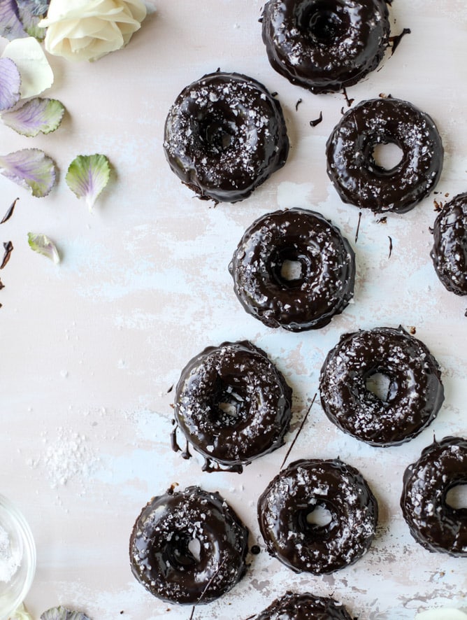 salted dark chocolate fudge donuts I howsweeteats.com #chocolate #donuts #doughtnuts #salted #fudge