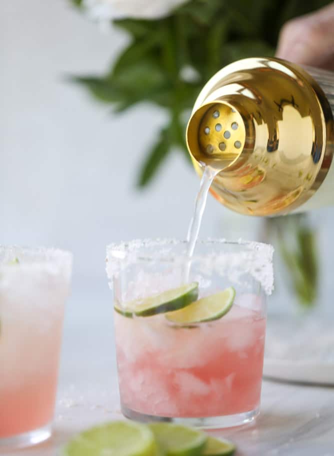 smoked strawberry mezcal margaritas I howsweeteats.com #margaritas #mezcal #strawberry #lime