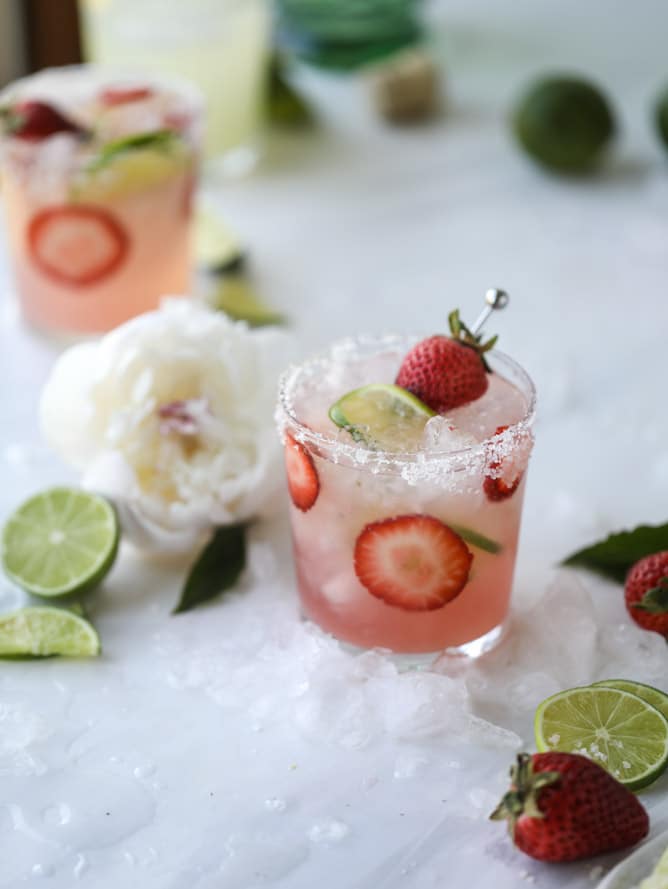 smoked strawberry mezcal margaritas I howsweeteats.com #margaritas #mezcal #strawberry #lime
