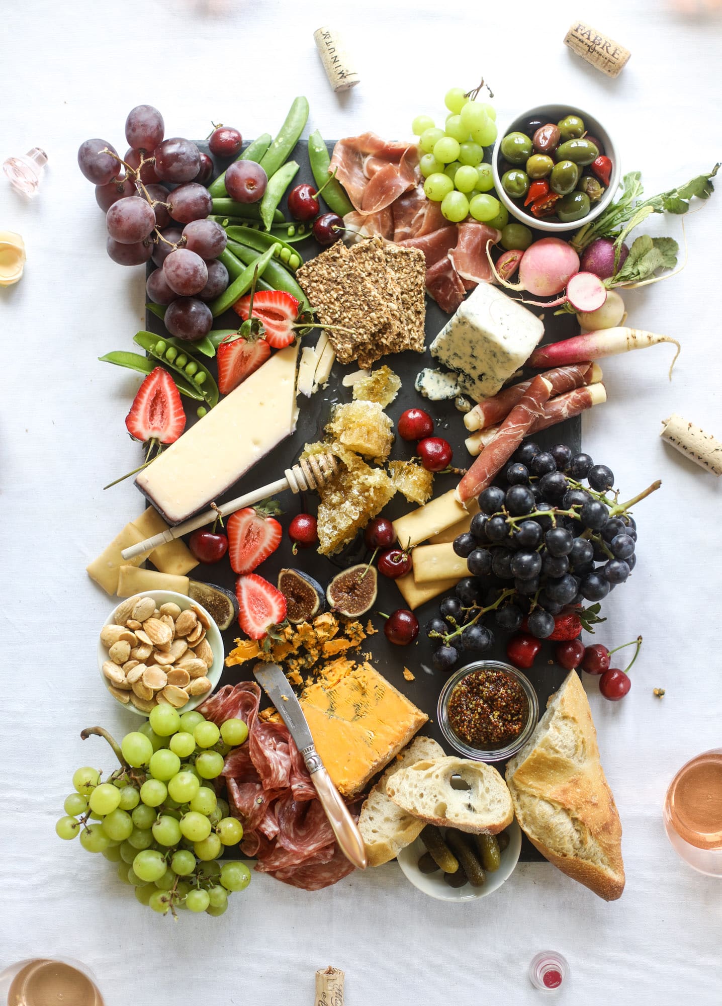 The best rosé to drink - all here in one epic summer guide for you! I'm sharing my personal favorite top ten rosé wines to drink in summer 2018, along with the perfect cheese board and snacks to go with. I howsweeteats.com #rosé #rose #summer #2018 #cheeseboard 