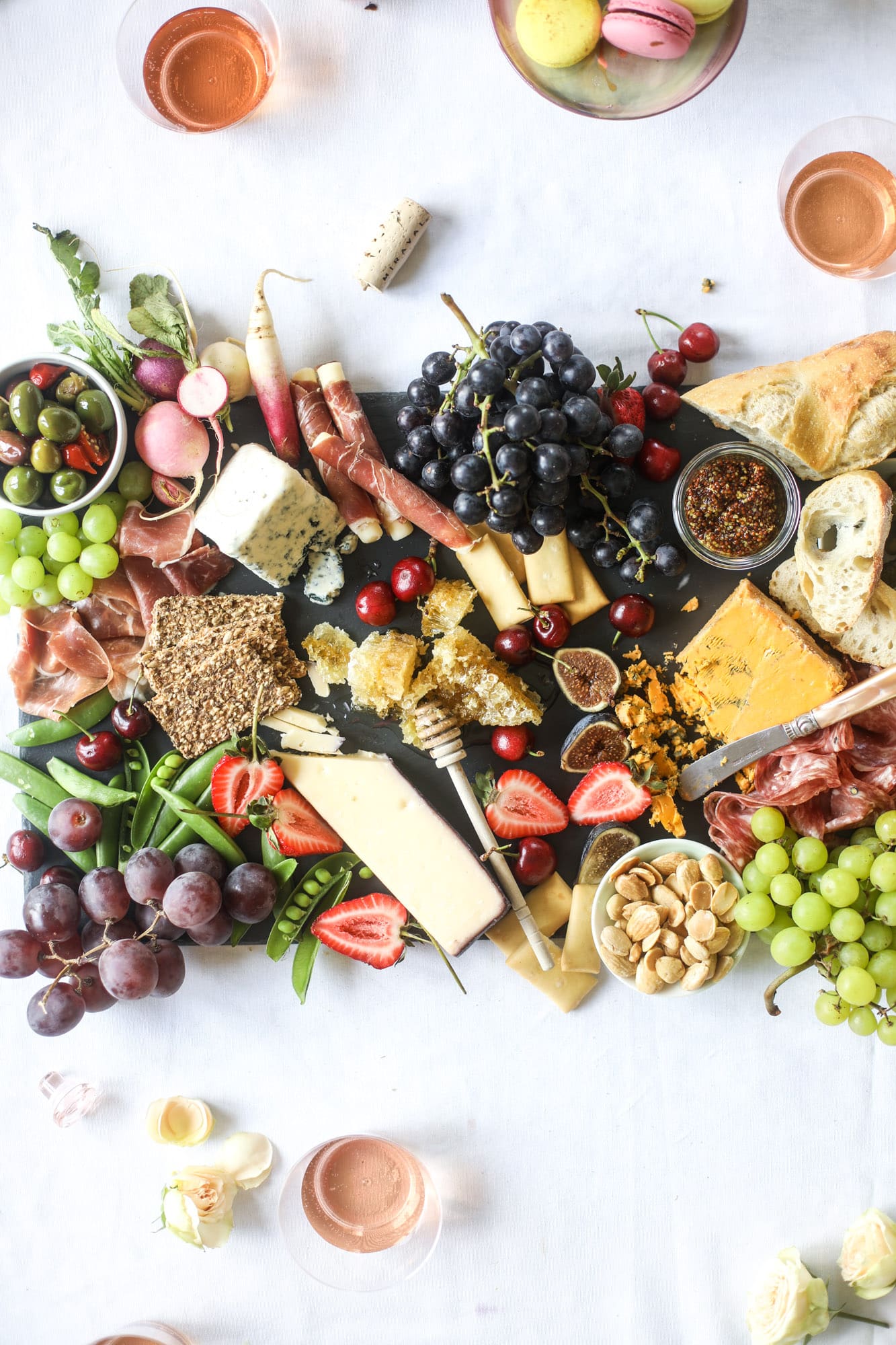 The best rosé to drink - all here in one epic summer guide for you! I'm sharing my personal favorite top ten rosé wines to drink in summer 2018, along with the perfect cheese board and snacks to go with. I howsweeteats.com #rosé #rose #summer #2018 #cheeseboard 