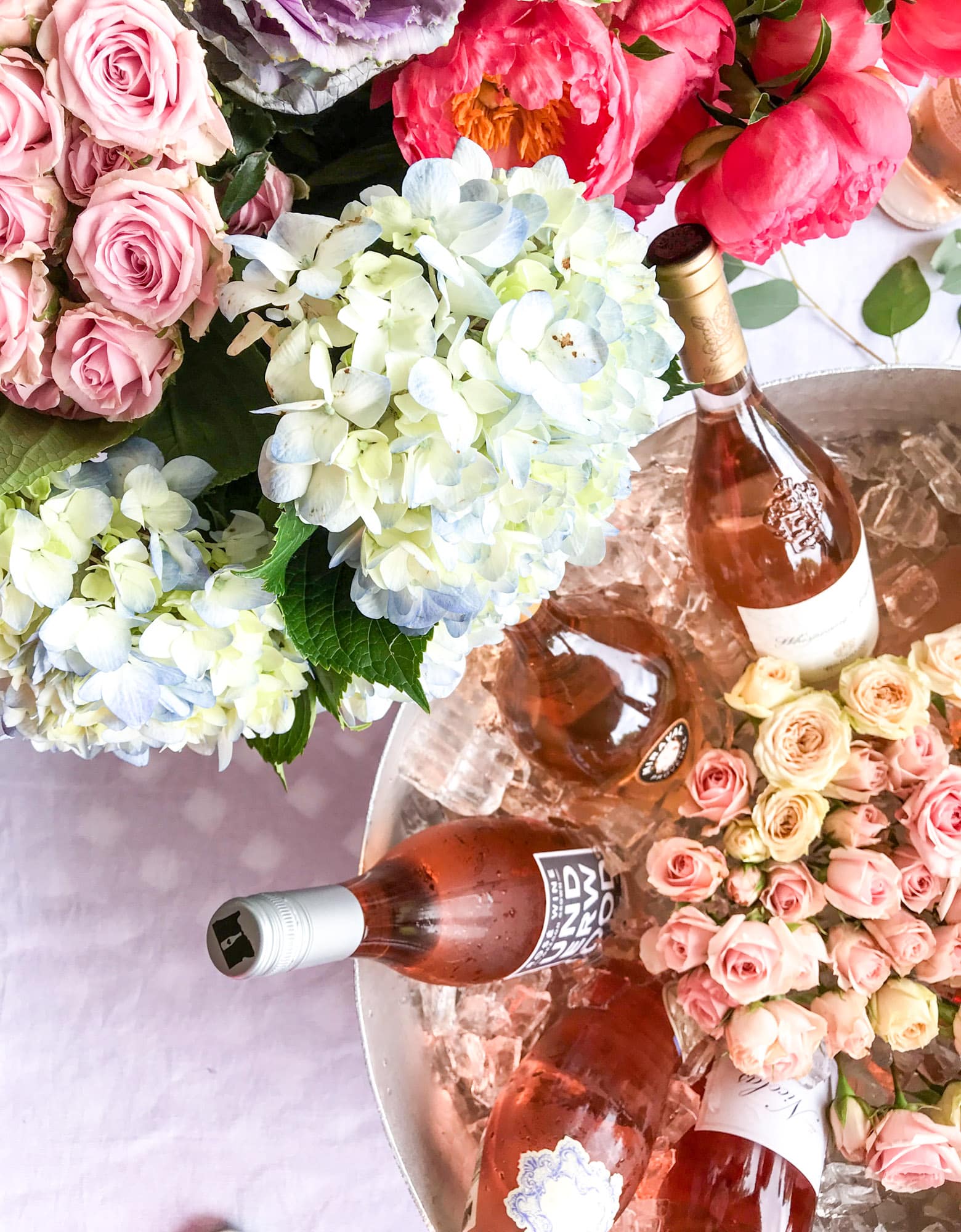 The best rosé to drink - all here in one epic summer guide for you! I'm sharing my personal favorite top ten rosé wines to drink in summer 2018, along with the perfect cheese board and snacks to go with. I howsweeteats.com #rosé #rose #summer #2018 #cheeseboard 